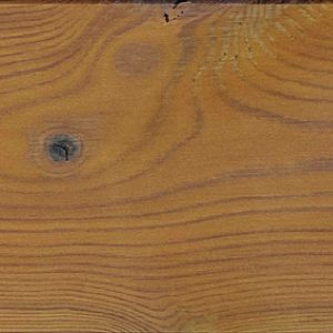 Thermory Vivid Exotic Brown translucent finish on knot-free Clear Pine cladding sample