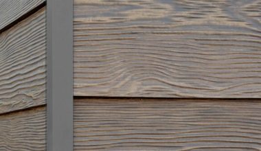 River Rock RusticSeries wood-look composite siding on James Hardie fiber cement lap siding