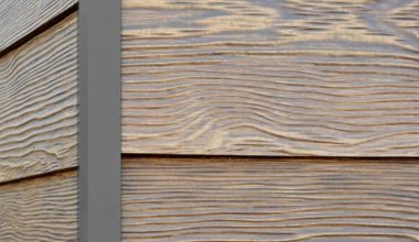 Summer Wheat RusticSeries wood-look composite siding on James Hardie fiber cement lap siding